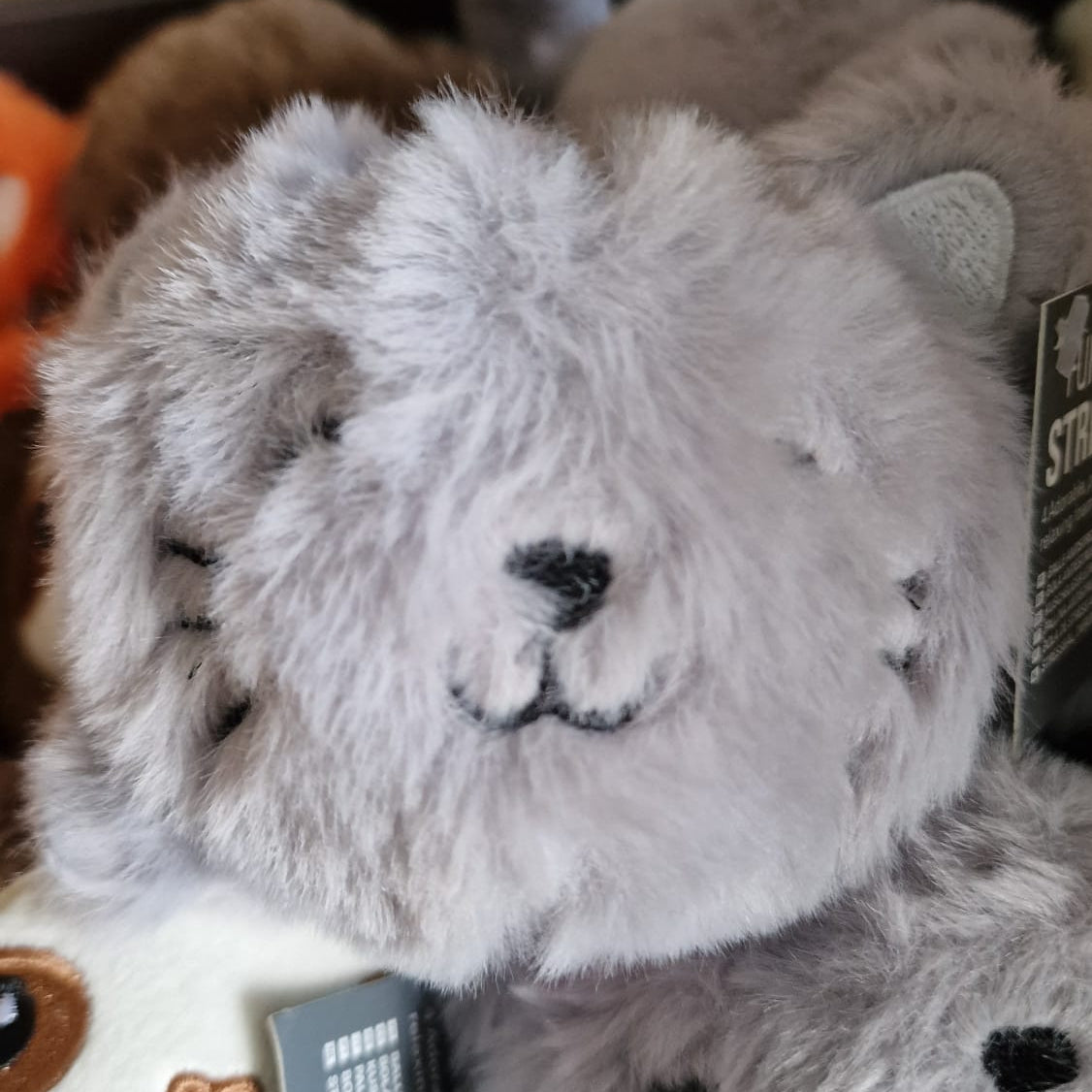 Close-up of a plush cat stress ball 